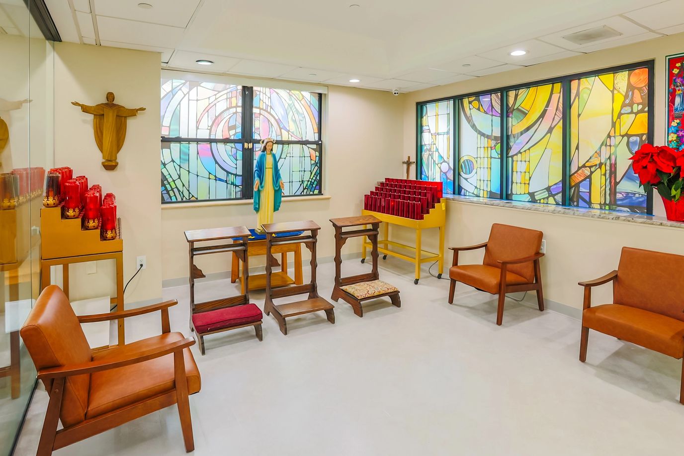 Bright interior common area with chairs and stained glass