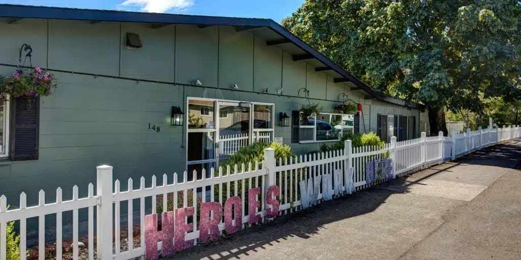 Exterior view of a nursing home with colorful signage