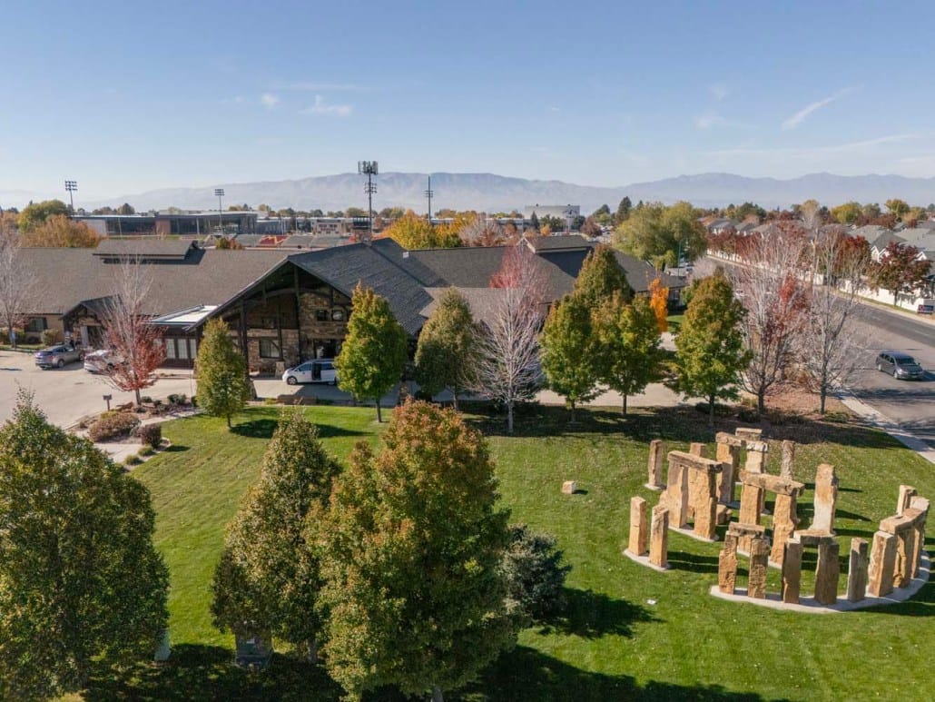 Aerial view of a senior living facility with outdoor landscaping