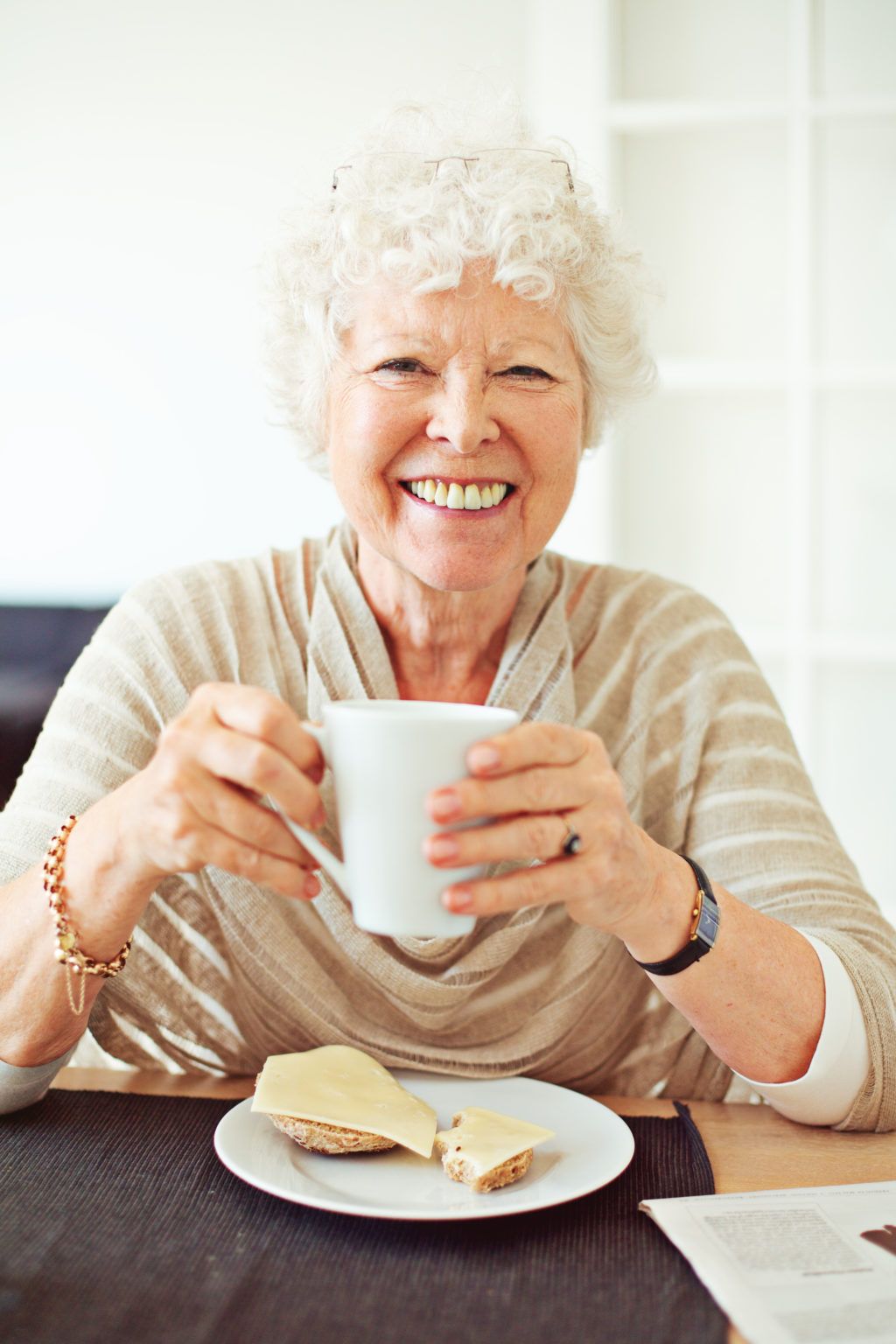Chippewa Manor Nursing and Rehabilitation, Nursing Home in Chippewa Falls, WI — Smiling senior woman holding a cup of coffee