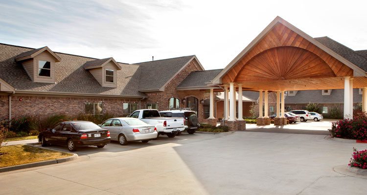 Exterior view of a senior living facility entrance