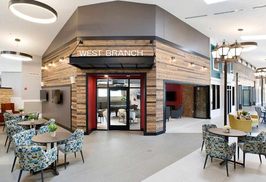 Modern common area with seating and wooden accents