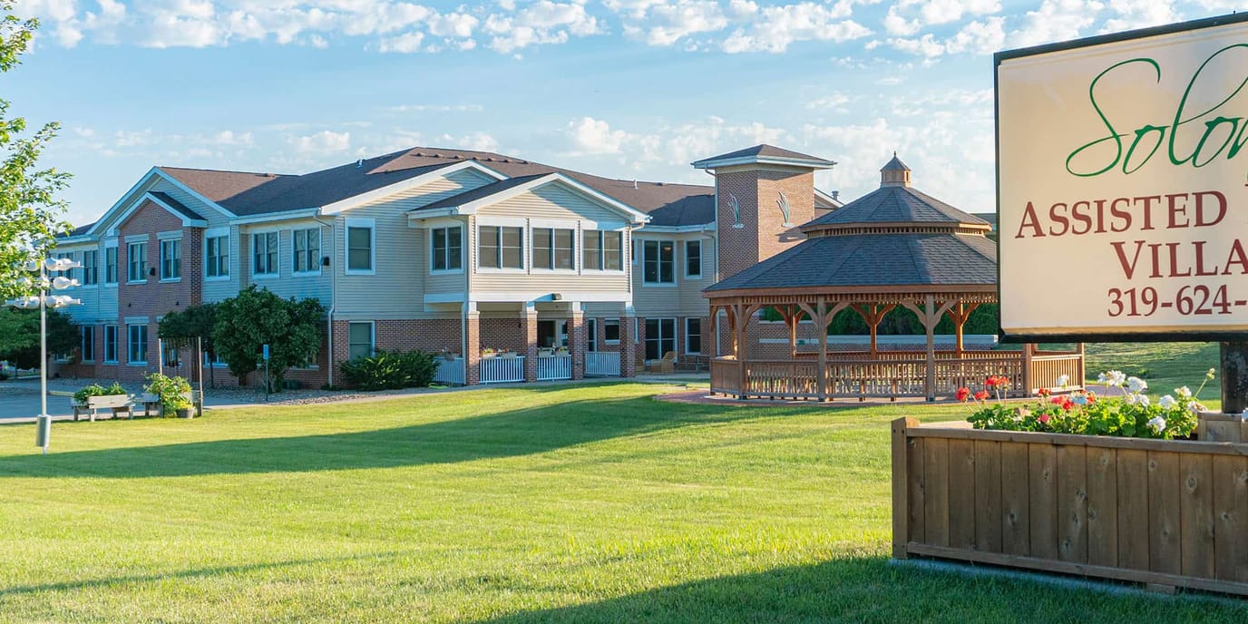 Exterior view of the assisted living facility with gazebo