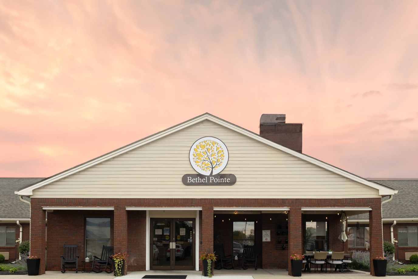 Exterior view of Bethel Pointe facility at sunset