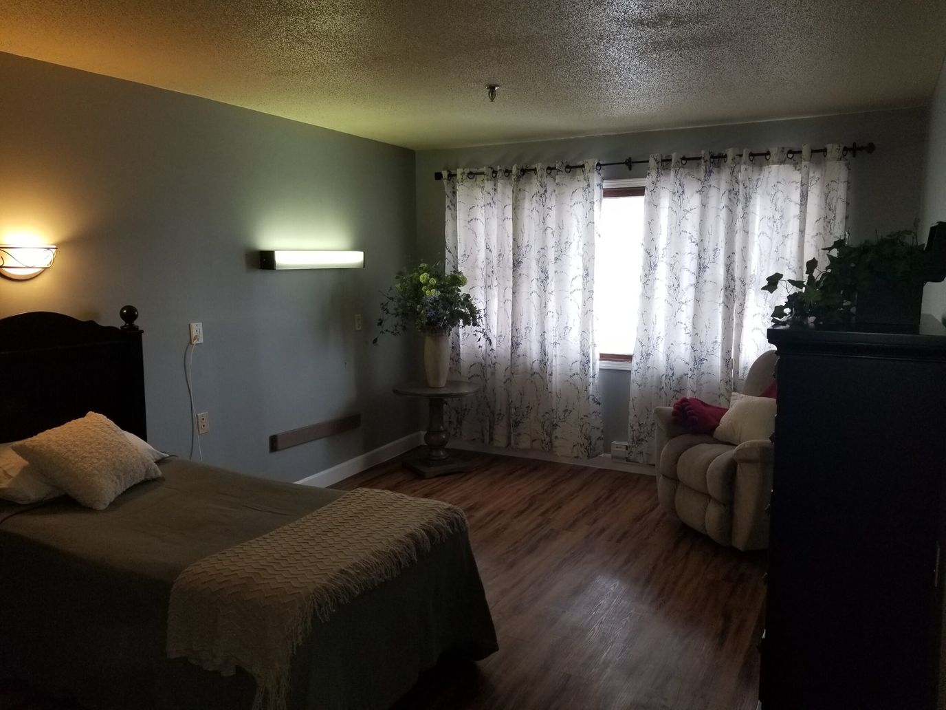 Private resident room with cozy furnishings