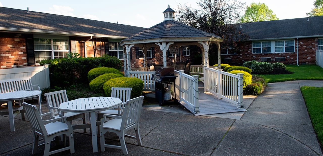 Serene outdoor gazebo area in a senior living facility