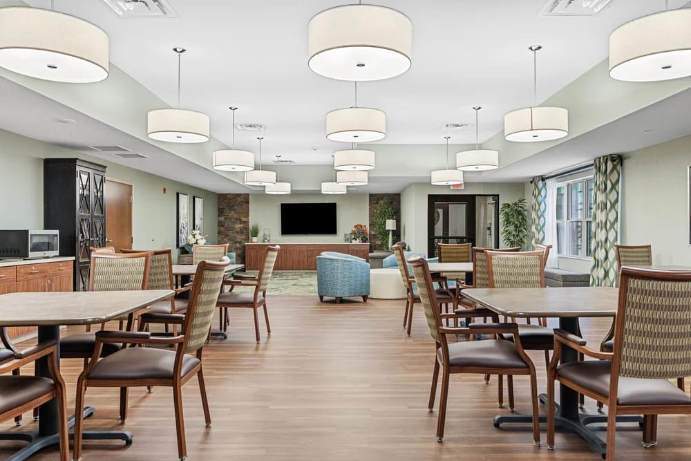 Bright common area with tables and chairs