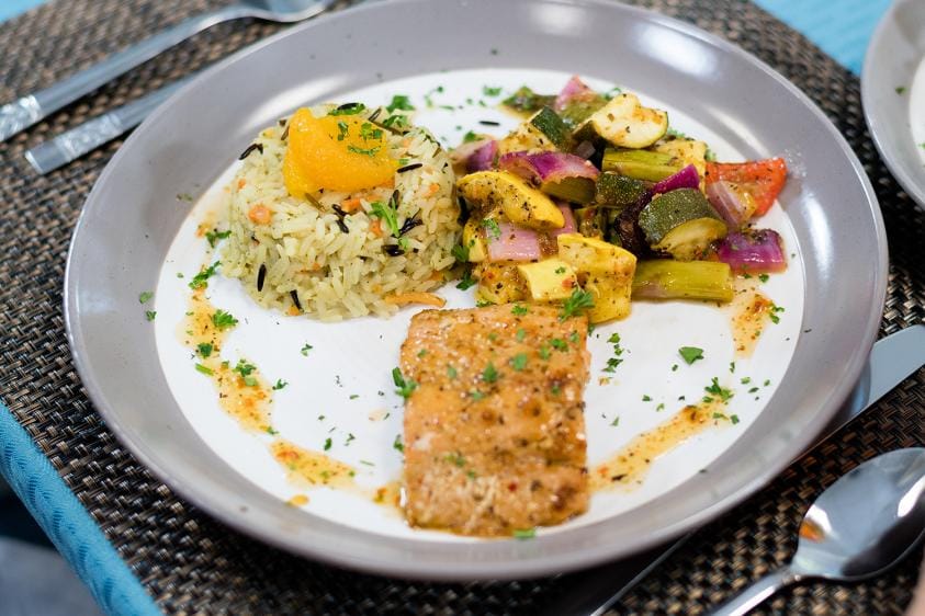 Delicious salmon dish with rice and vegetables
