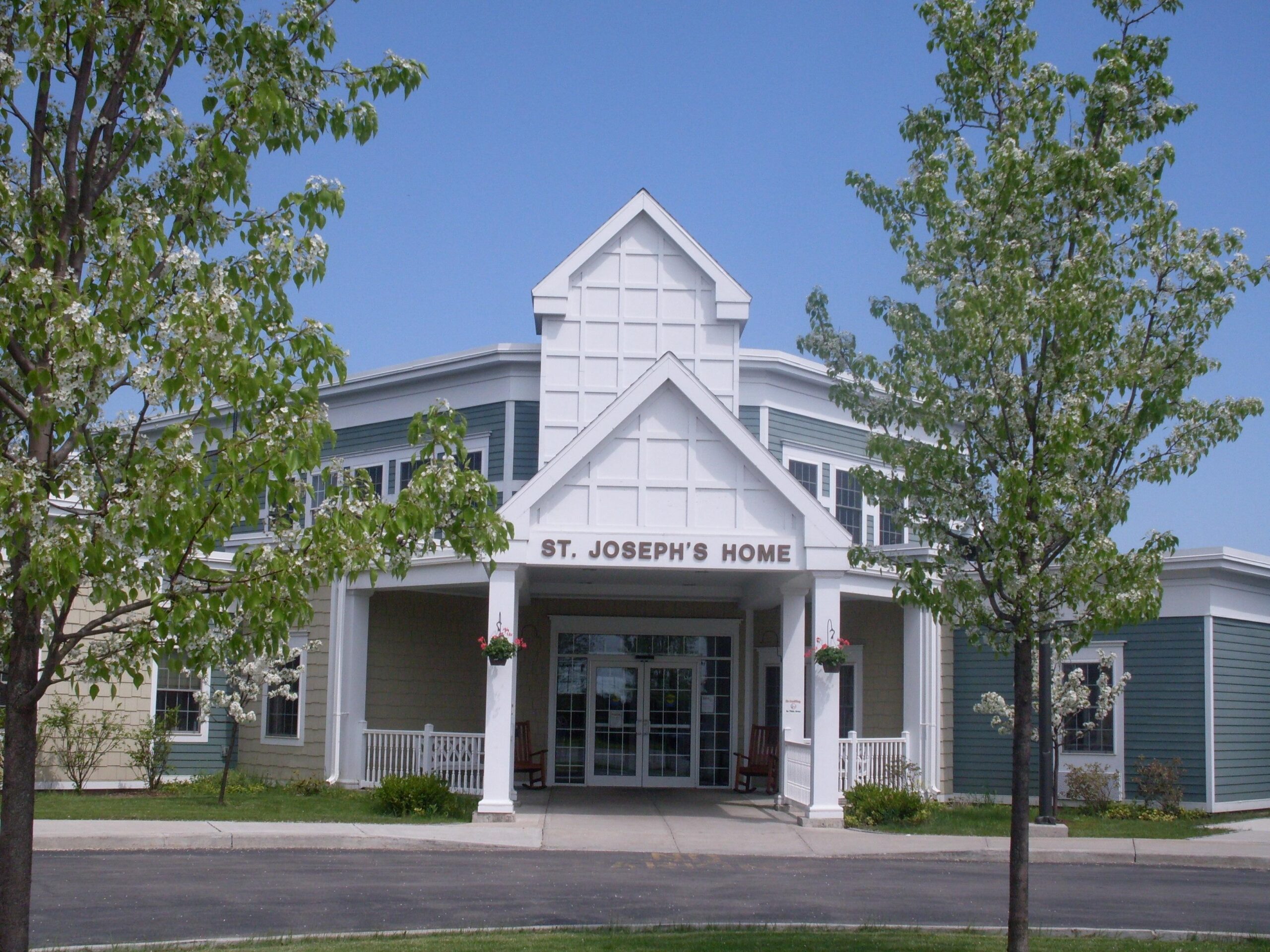 Exterior view of St. Joseph's Home with landscaping