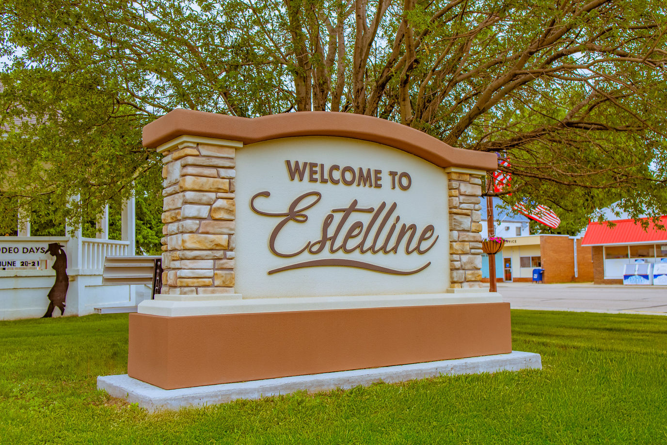 Welcome sign for Estelline with landscaping