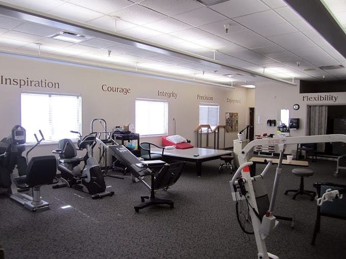 Interior of a physical therapy gym with equipment