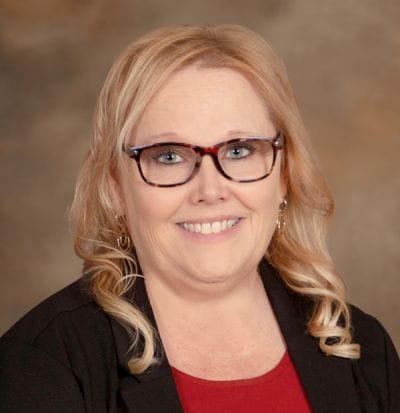 Professional portrait of a smiling staff member