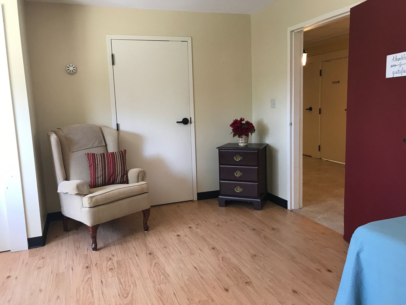Cozy interior room with a chair and decorative elements
