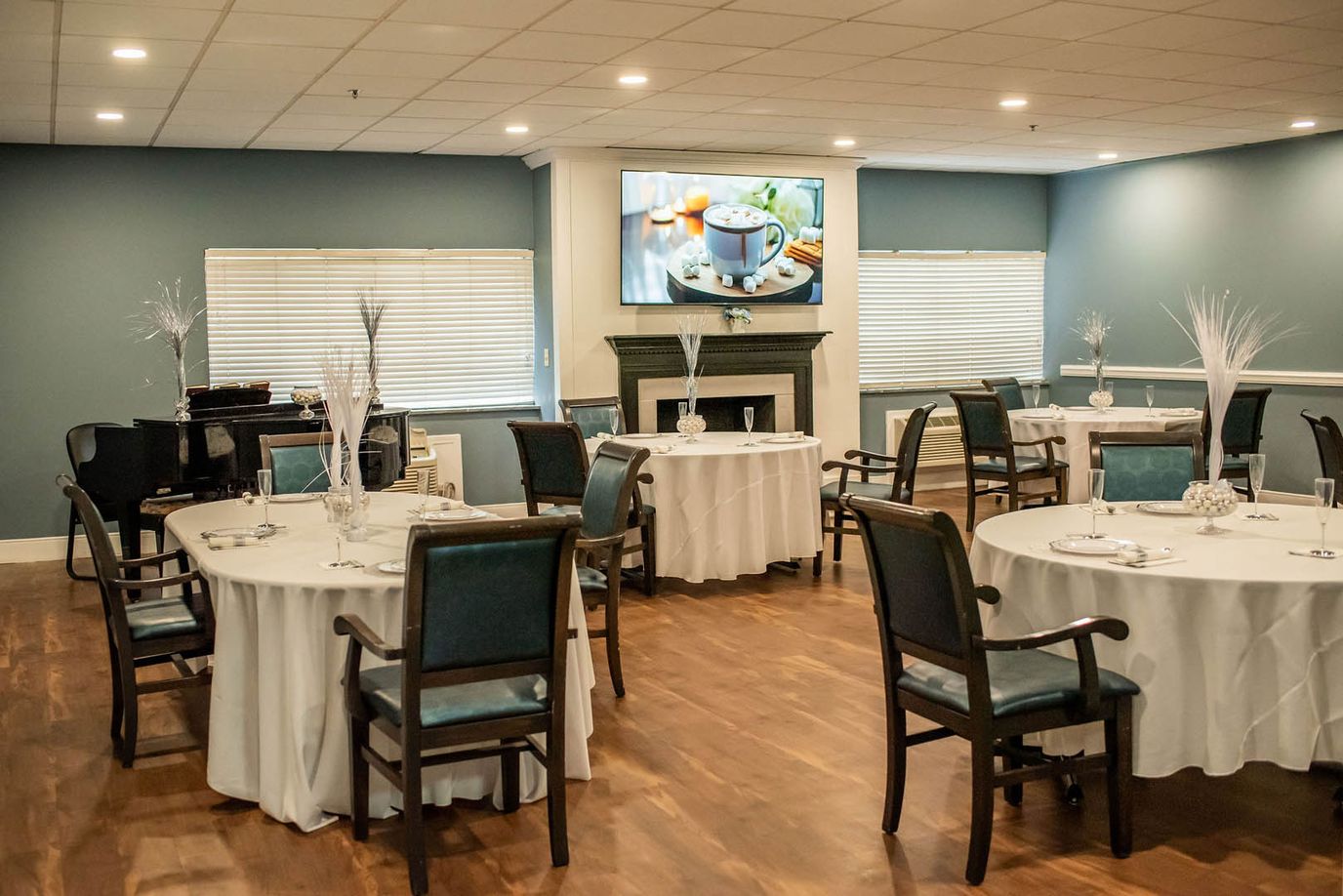 Dining room with elegantly set tables and decor