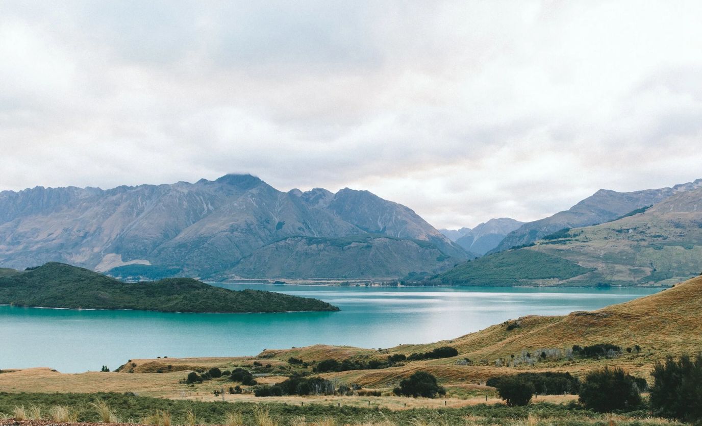 Scenic view of mountains and water landscape
