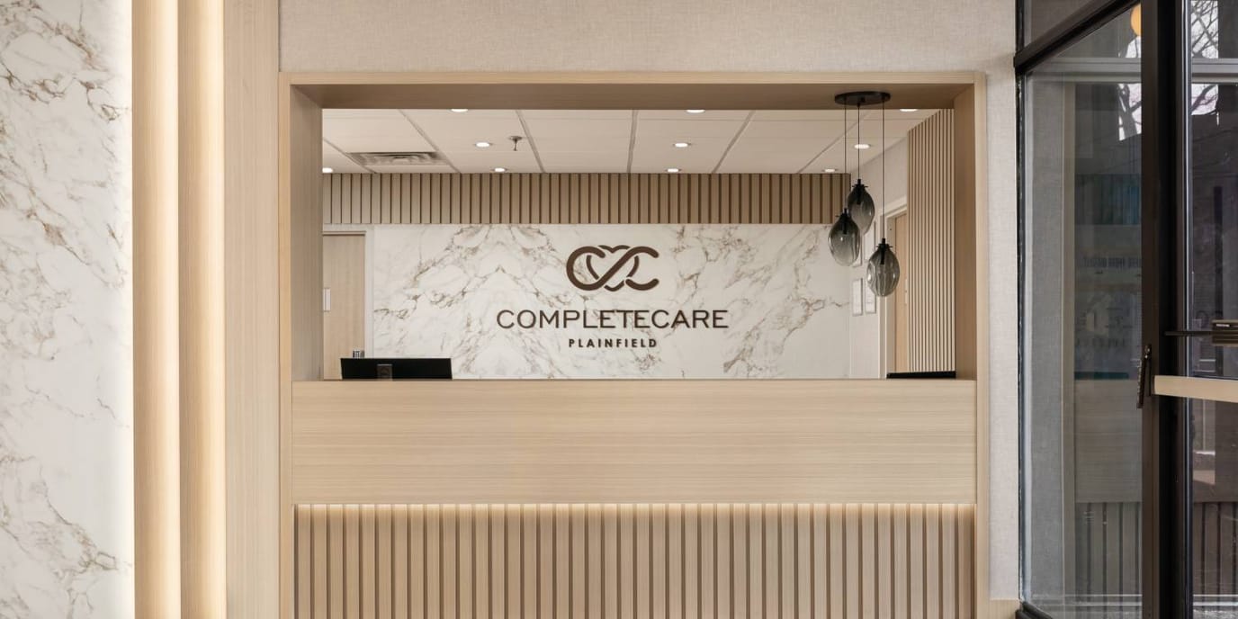 Complete Care At Plainfield Llc, Nursing Home in Plainfield, NJ — Reception area with facility logo