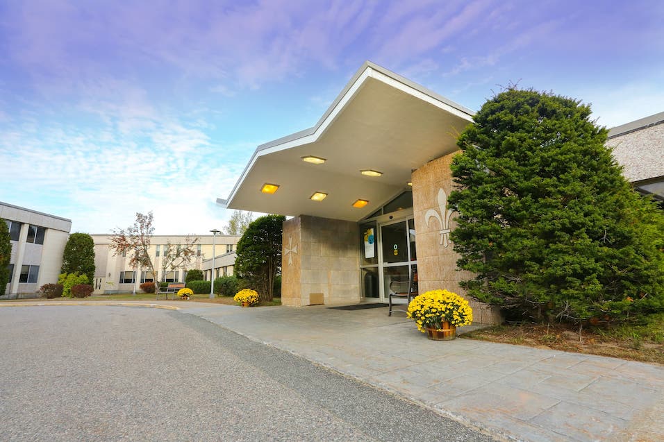 Exterior view of the main entrance with landscaping