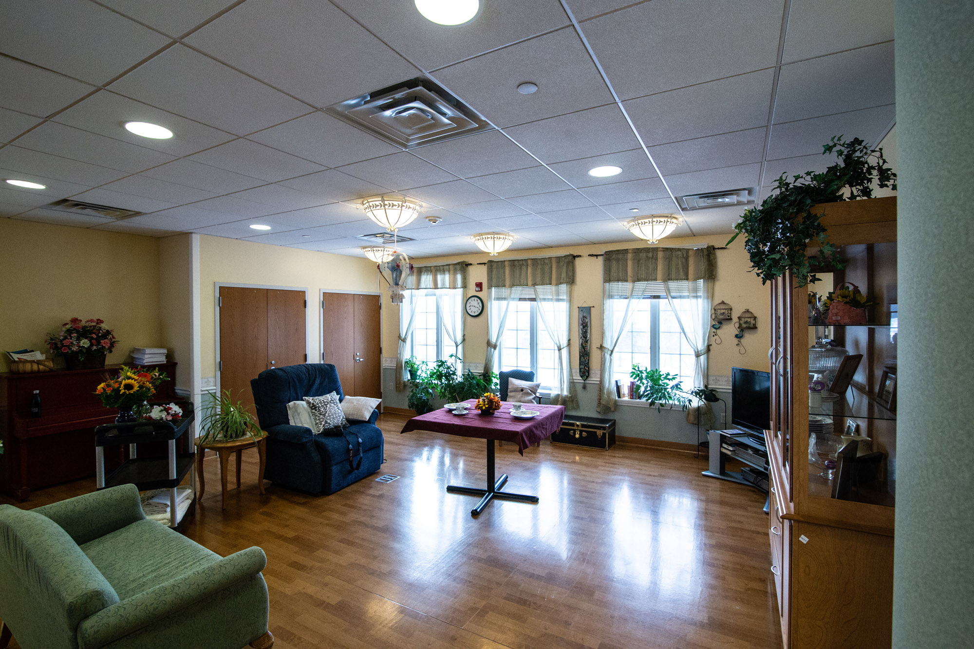 Bright common area with comfortable seating and natural light