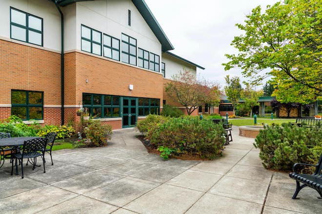 Exterior view of the facility with outdoor seating