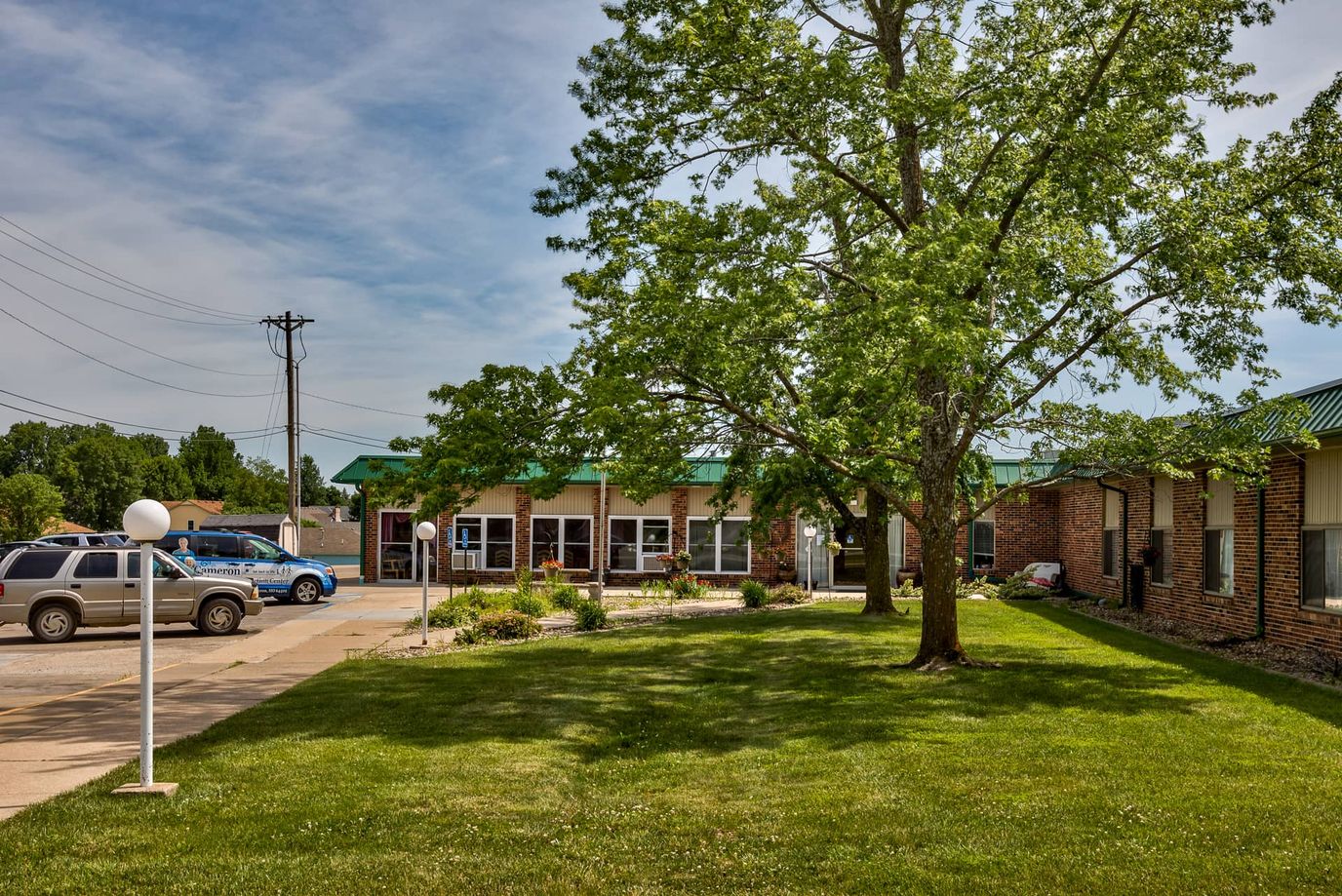 Exterior view of Cameron Nursing Center's entrance and landscape