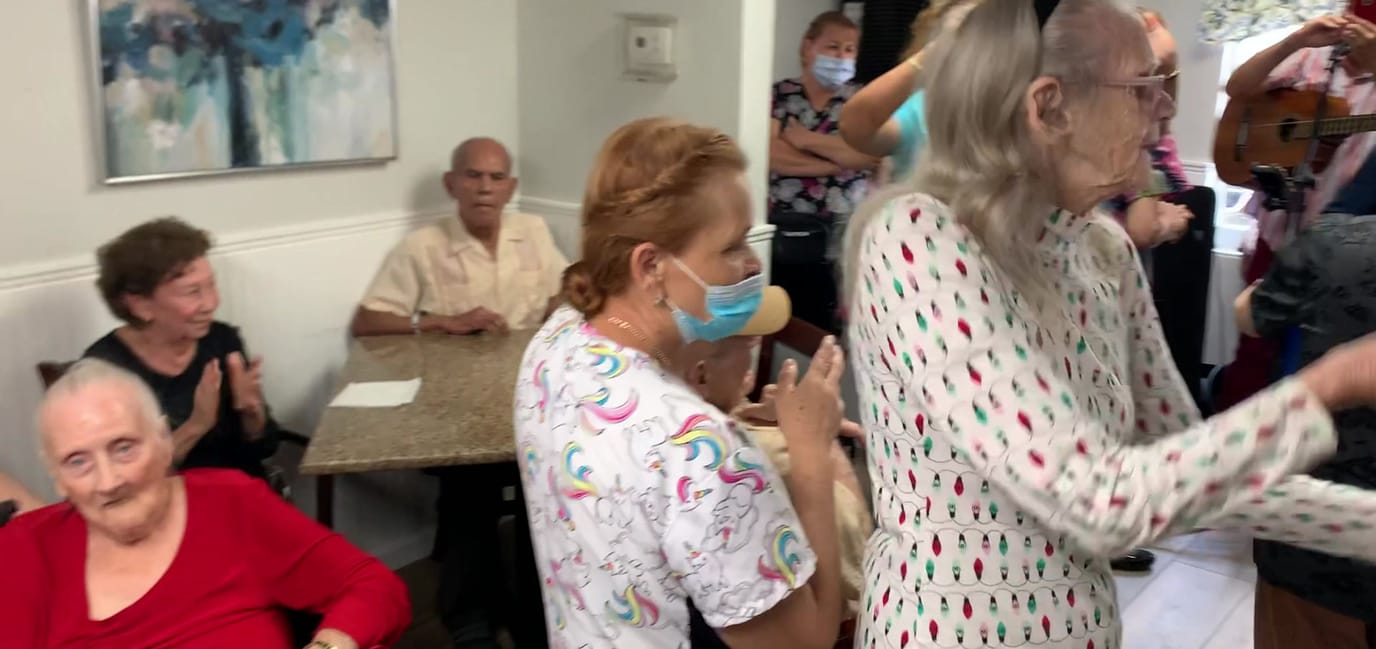Residents and staff enjoying a lively music event