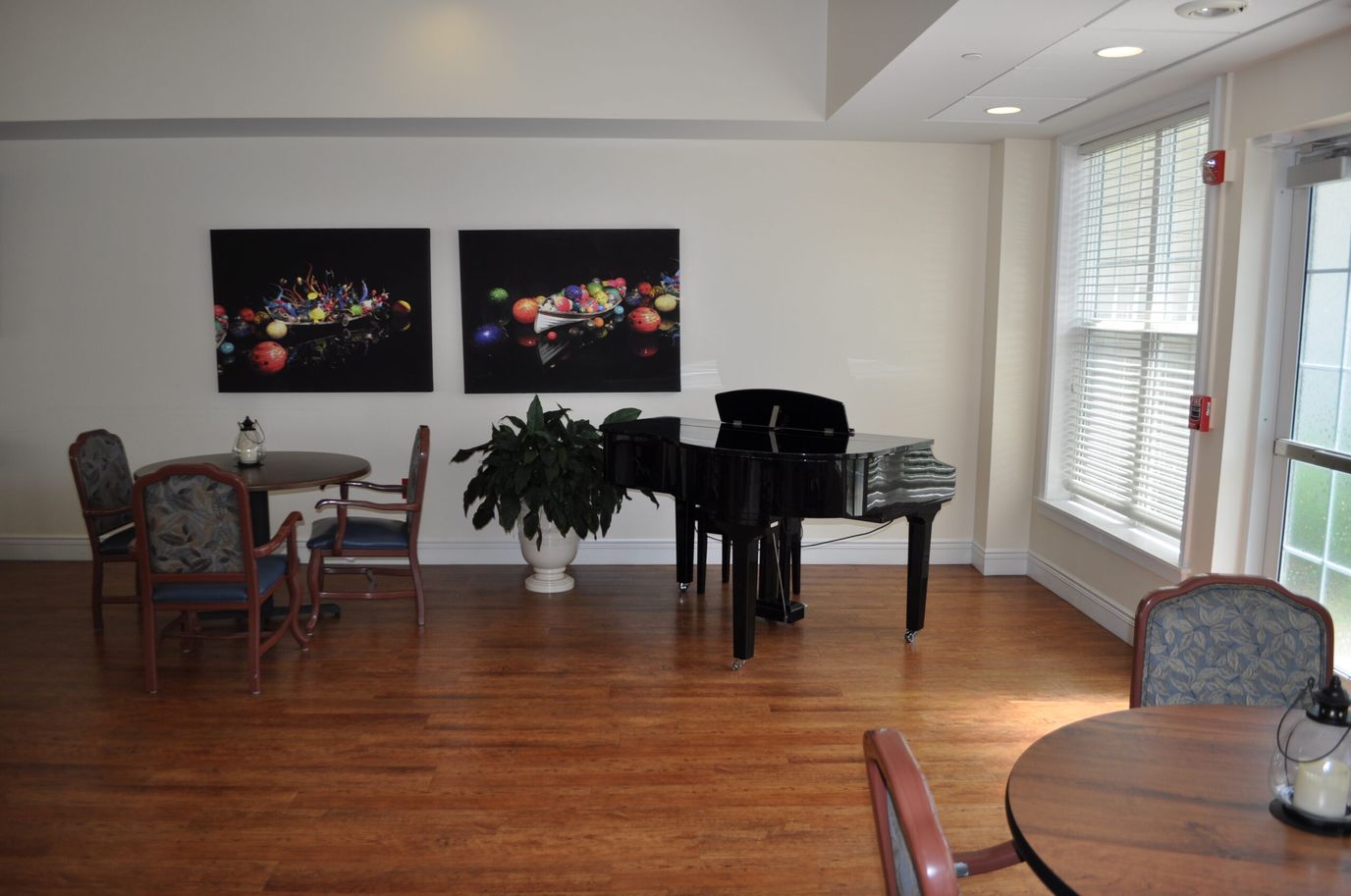 Interior common area with a piano and artwork