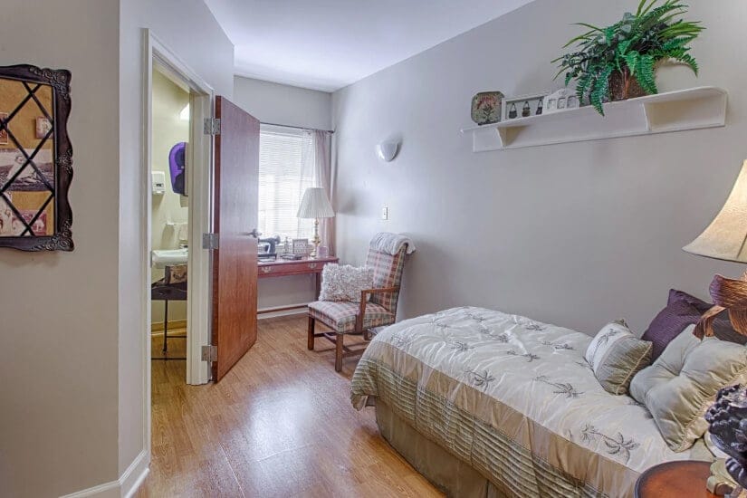 Cozy resident room with a bed and desk