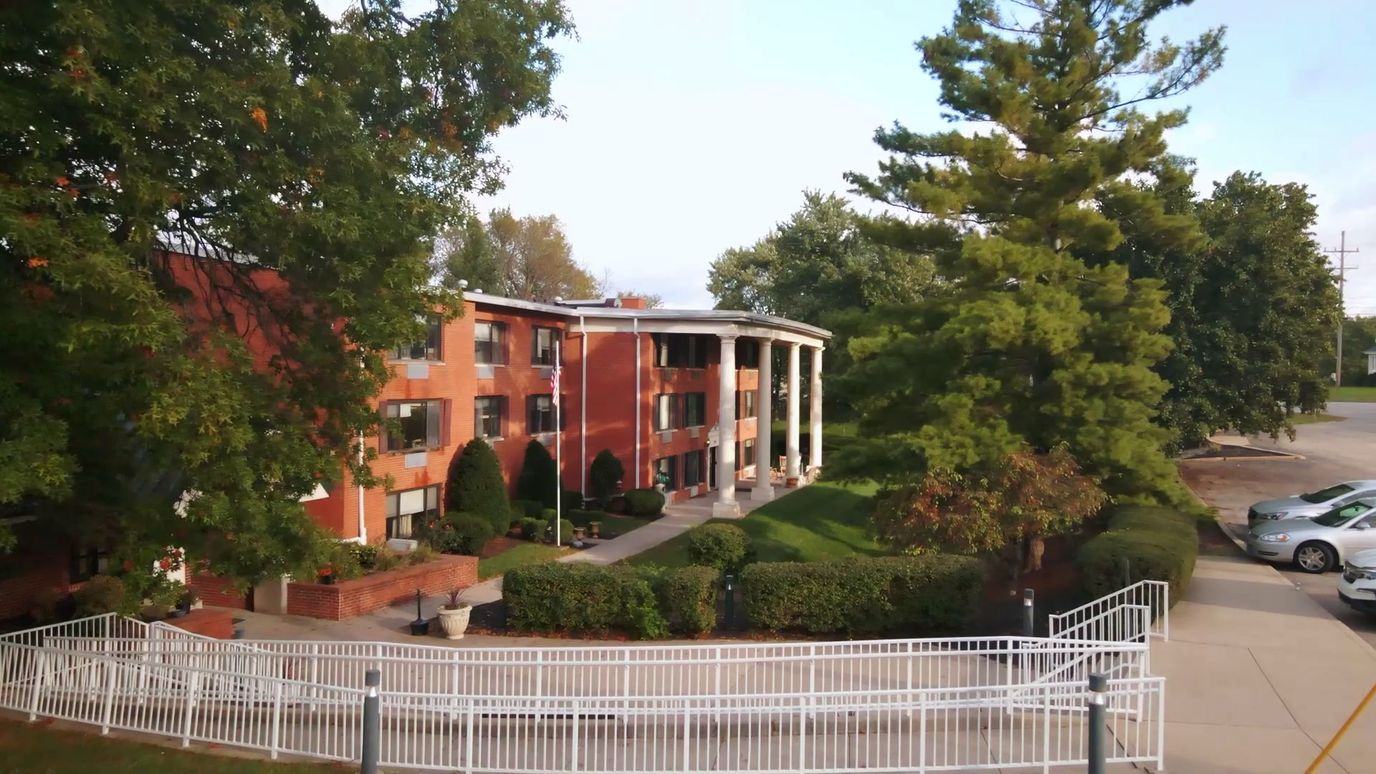 Exterior view of Envive of Lawrenceburg with landscaped grounds
