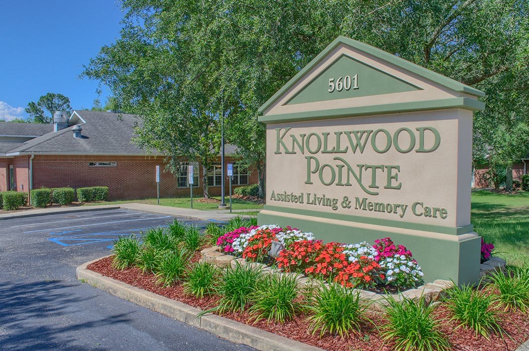 Building exterior with signage and landscaping