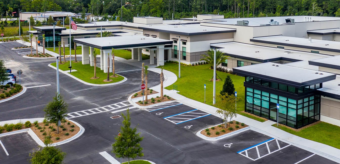 Aerial view of River City Center's exterior and parking lot