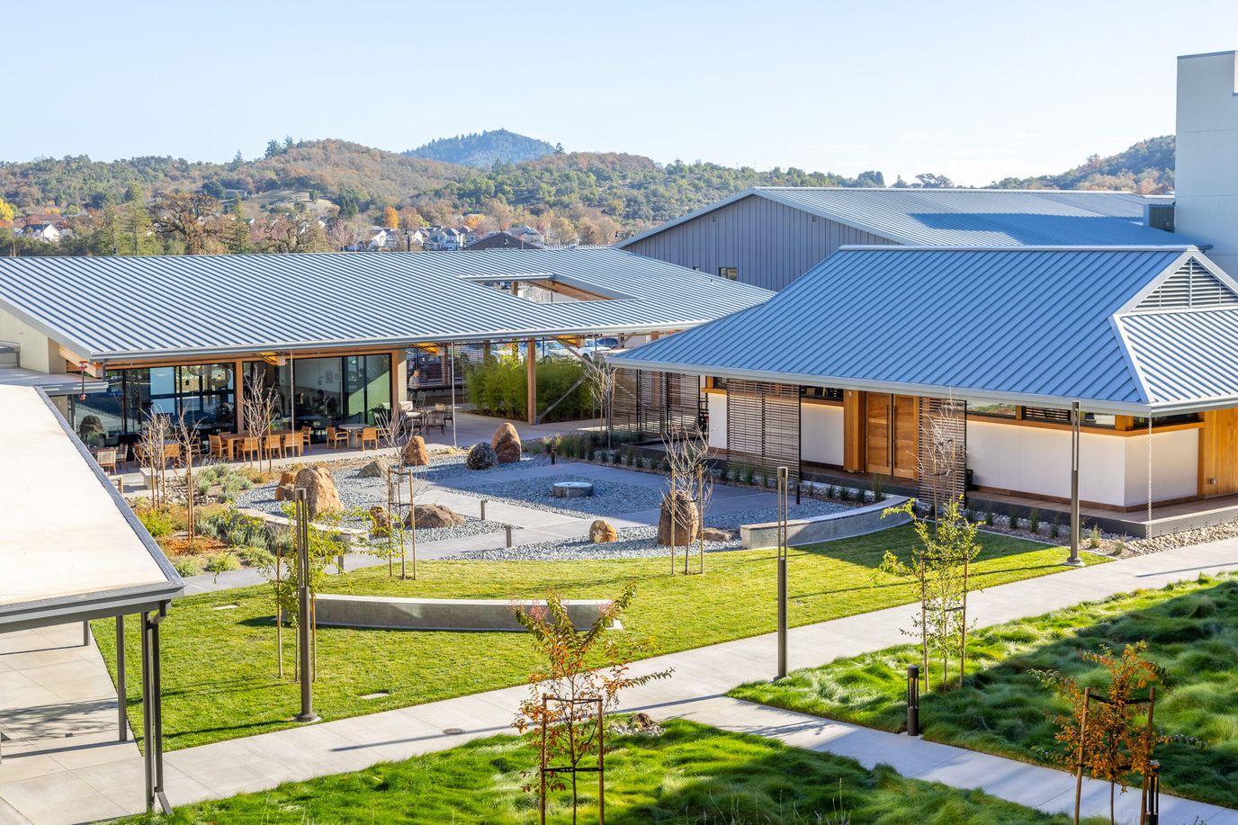 Outdoor area featuring landscaped gardens and pathways