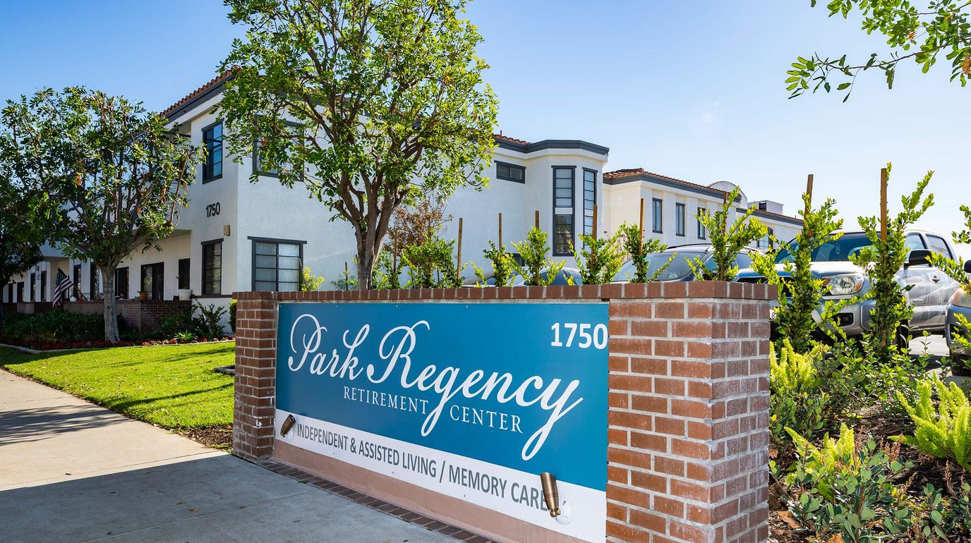 Exterior view of Park Regency Retirement Center sign and building