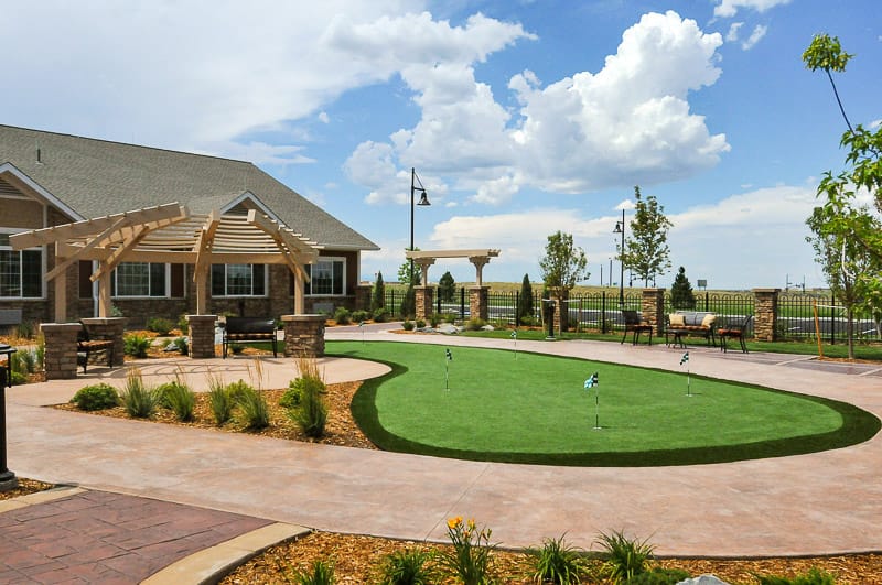 Exterior view of landscaped outdoor space at a senior living facility