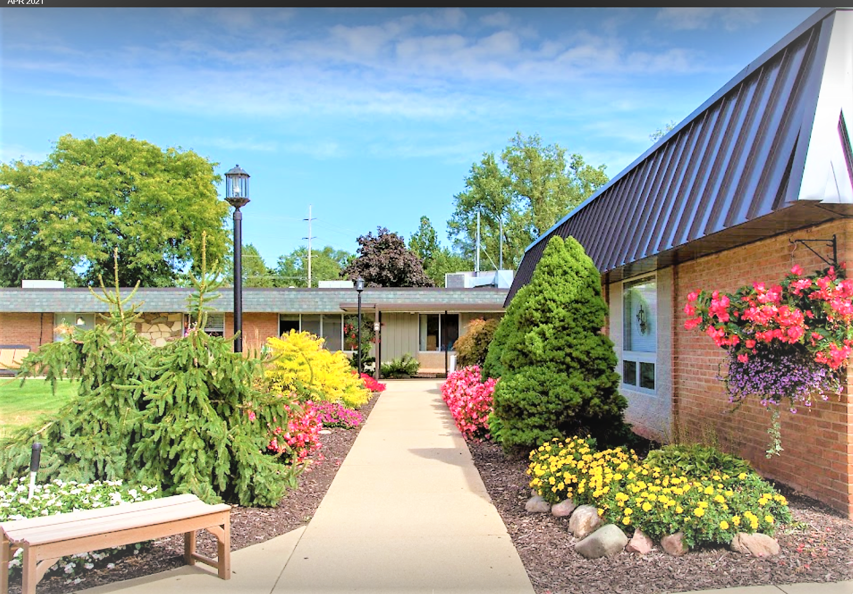 Pathway leading to the entrance of a senior living facility