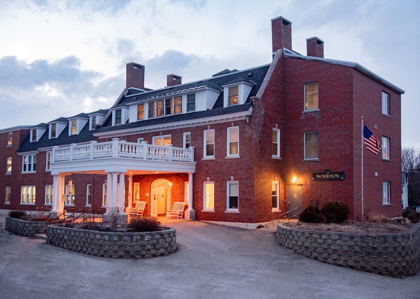Exterior view of Morrison Nursing Home at dusk
