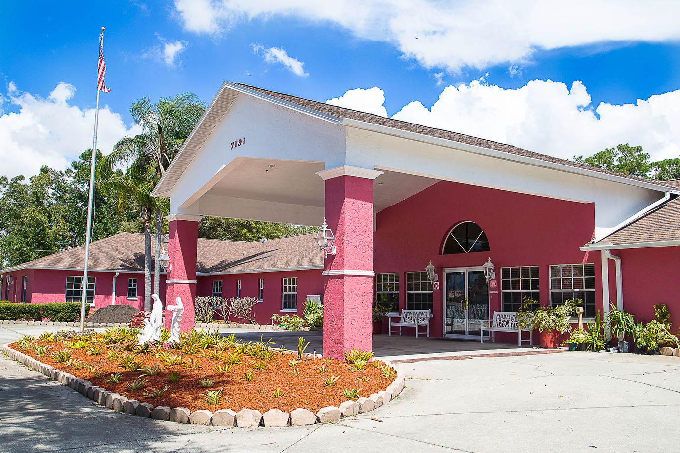 Exterior view of a nursing home with vibrant colors