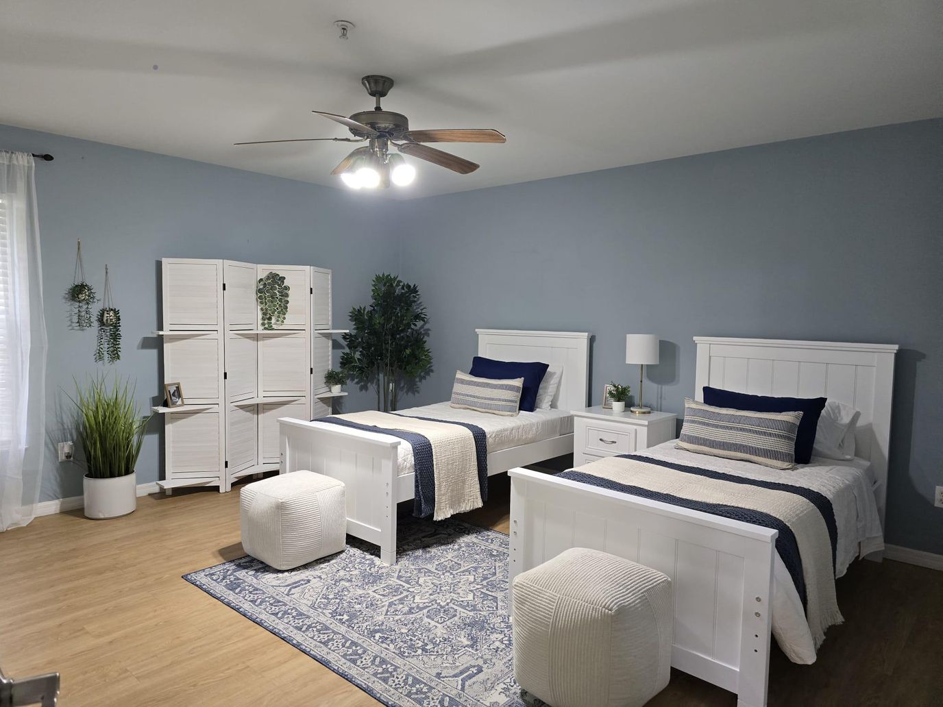 A shared room with two beds and decor