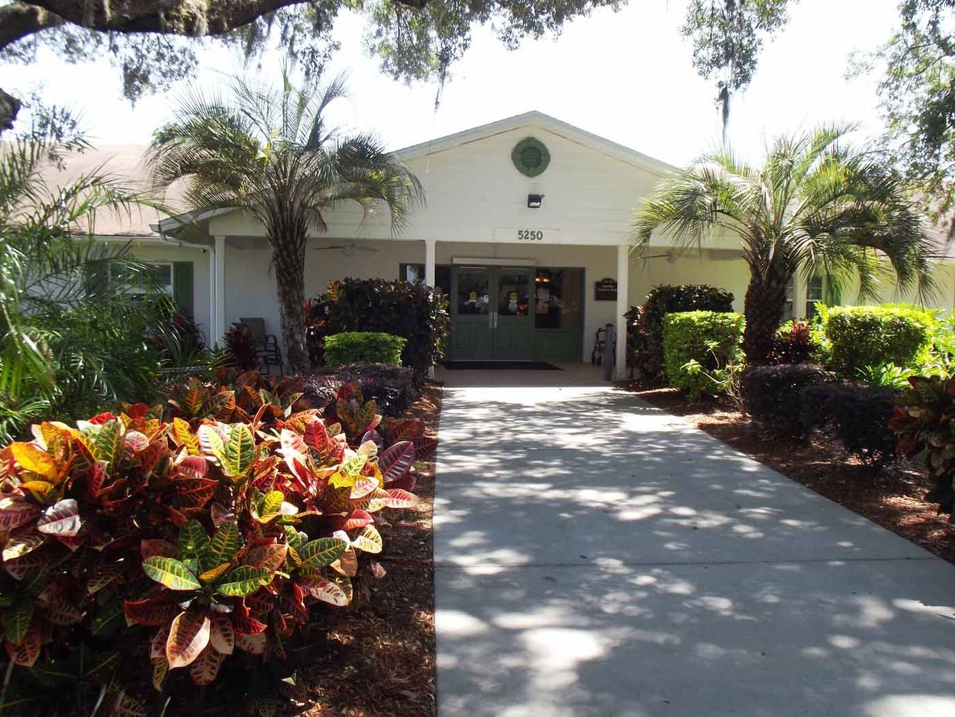 Entrance of Sunshine Christian Homes with landscaped garden