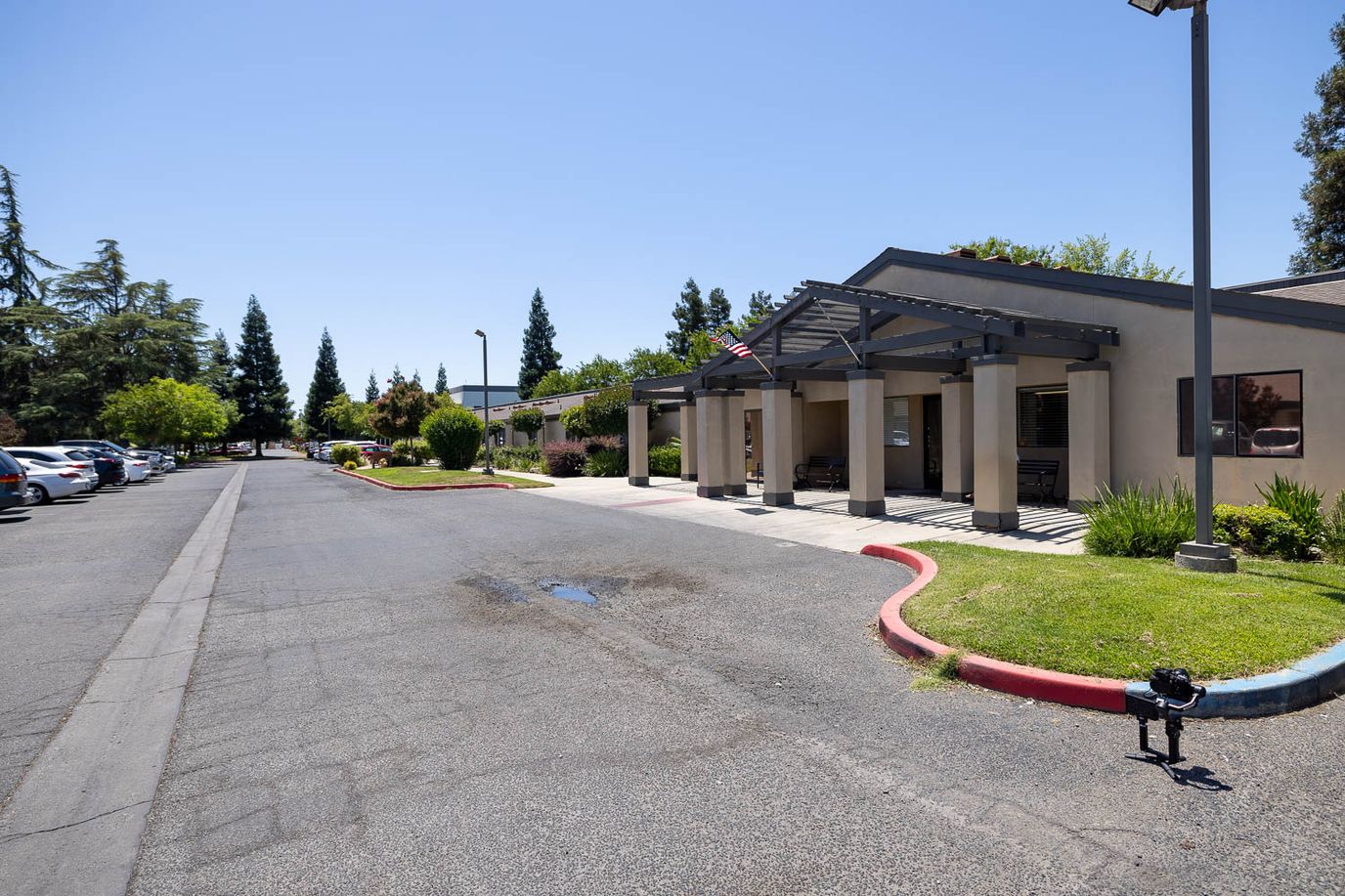Exterior view of the facility with landscaped area