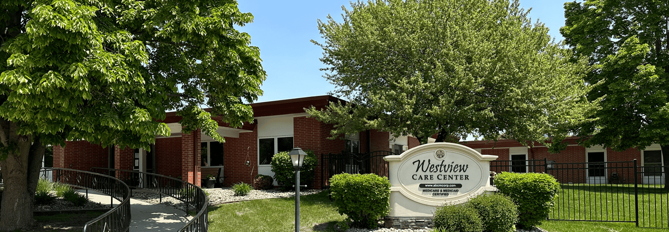 Exterior view of Westview Care Center surrounded by greenery