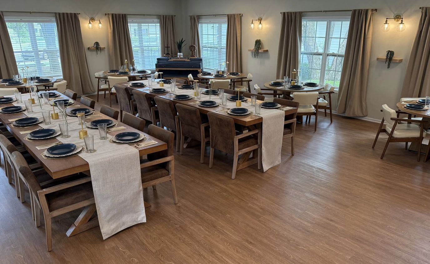 Dining area set up for a meal with elegant decor