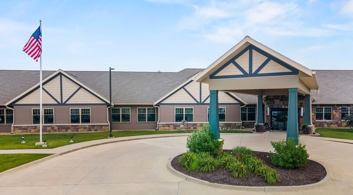 Exterior view of the Gardens of Cedar Rapids facility entrance