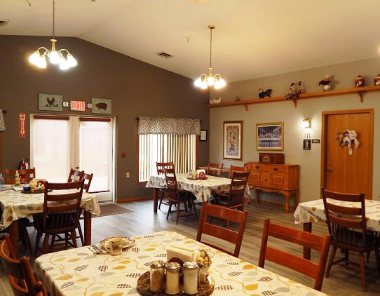 Interior dining area with tables and chairs