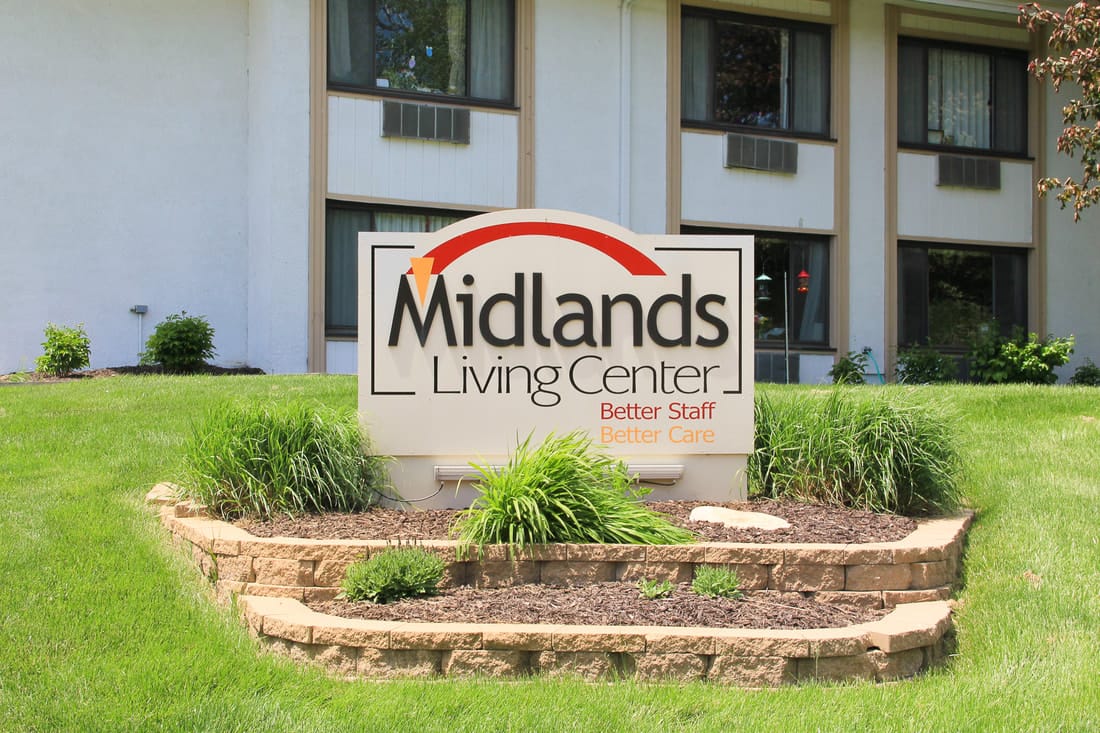 Sign for Midlands Living Center at the facility entrance