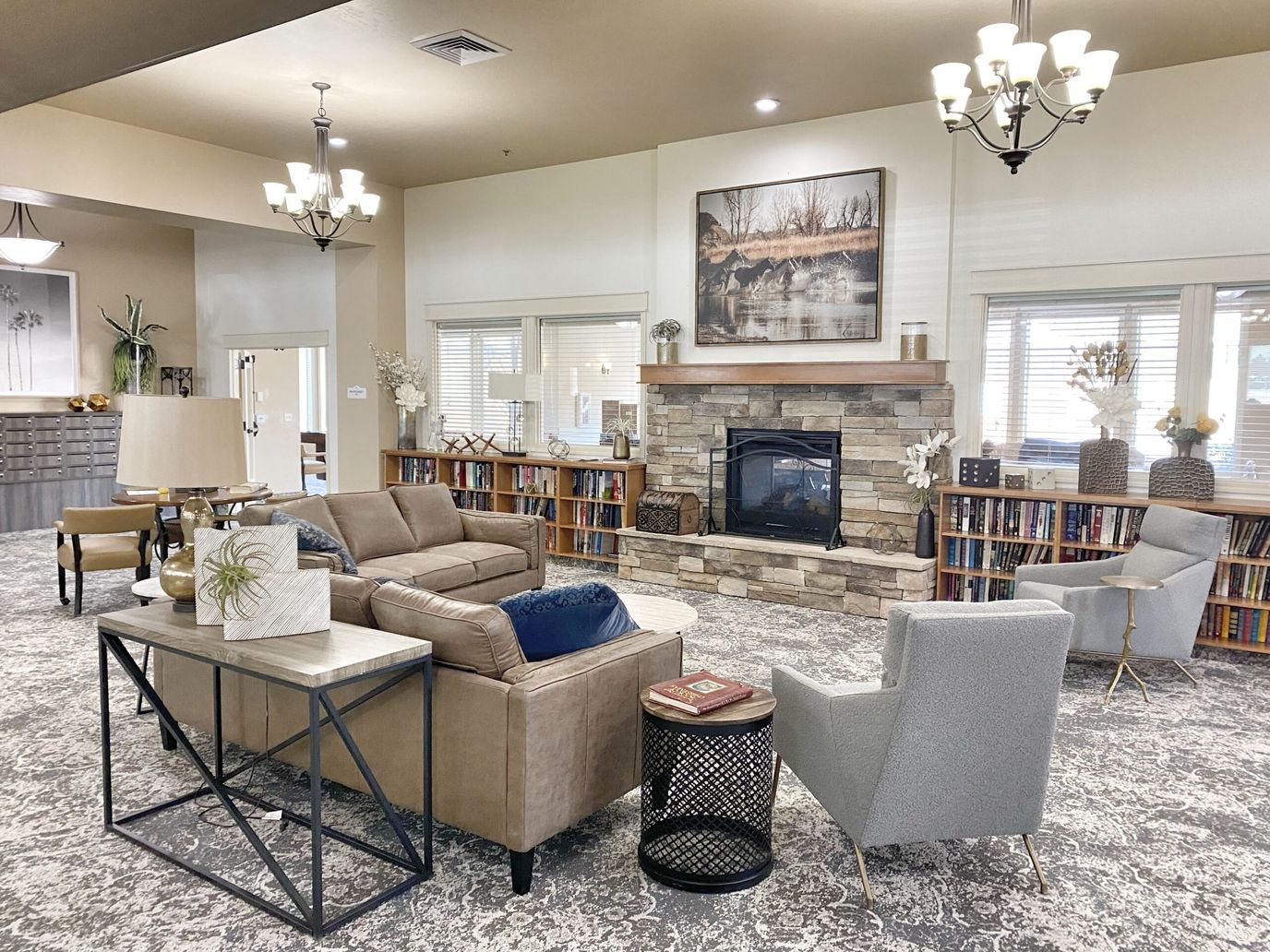 Cozy common area with seating and bookshelves