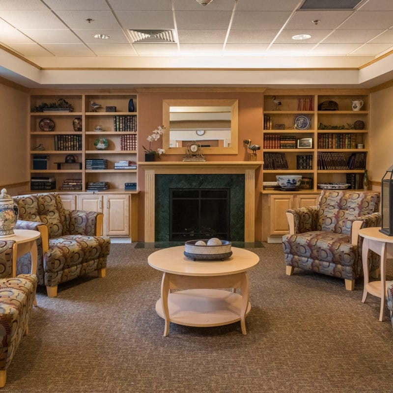 Interior common area with seating and bookshelves