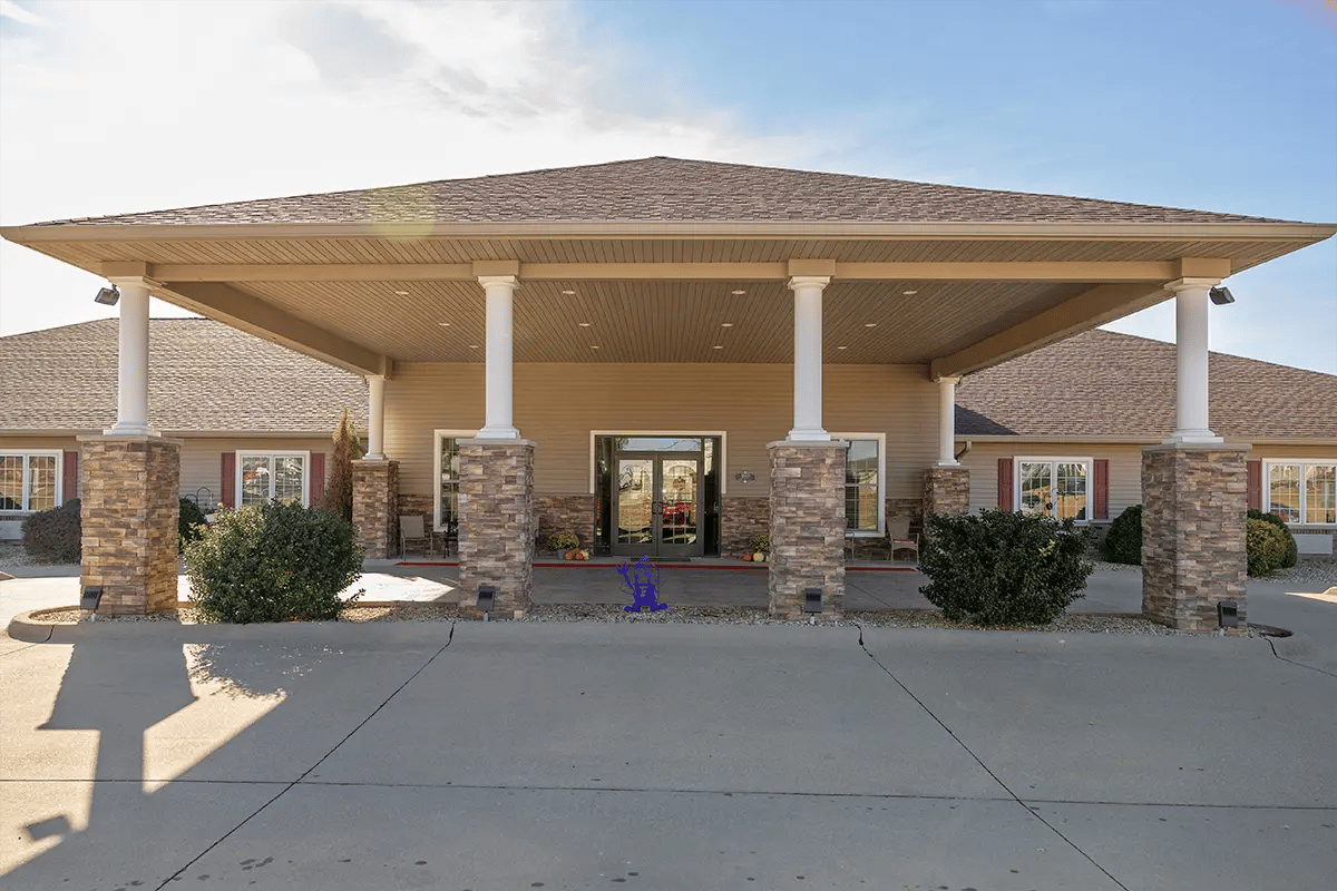 Entrance of assisted living facility with covered porch