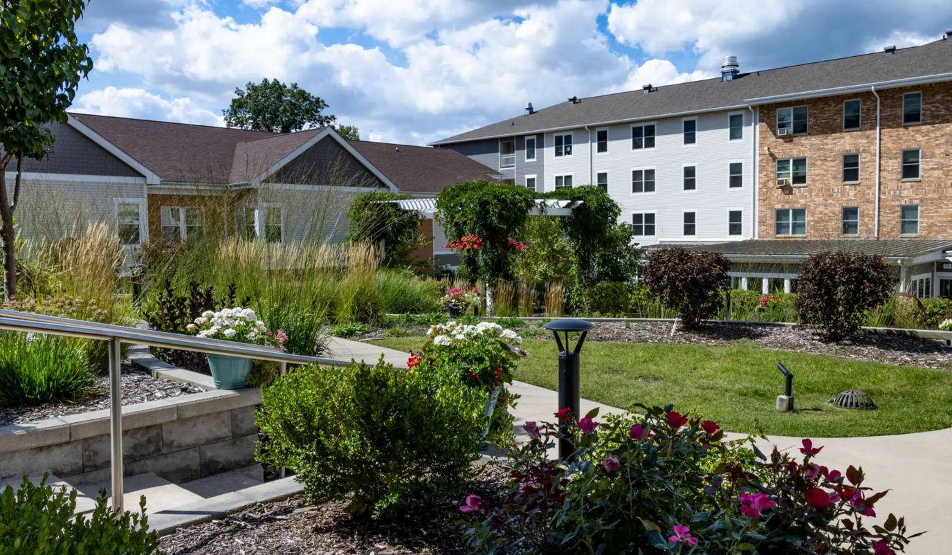 Beautifully landscaped outdoor space with flowers and greenery