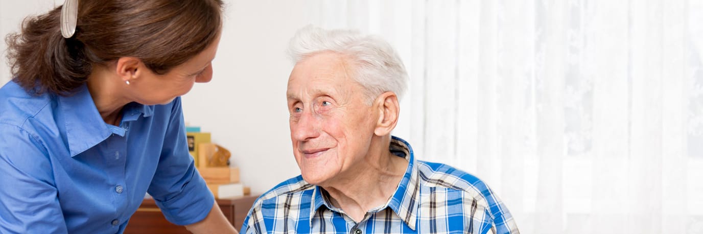 Staff member interacting with a resident