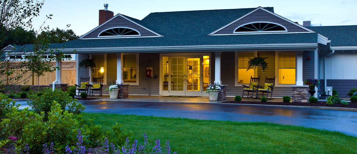 Exterior view of Avita of Needham with rocking chairs